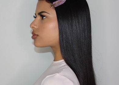 Profile view of a woman with sleek hair at Endless Lash Beauty Lounge, Miramar, Florida, US.