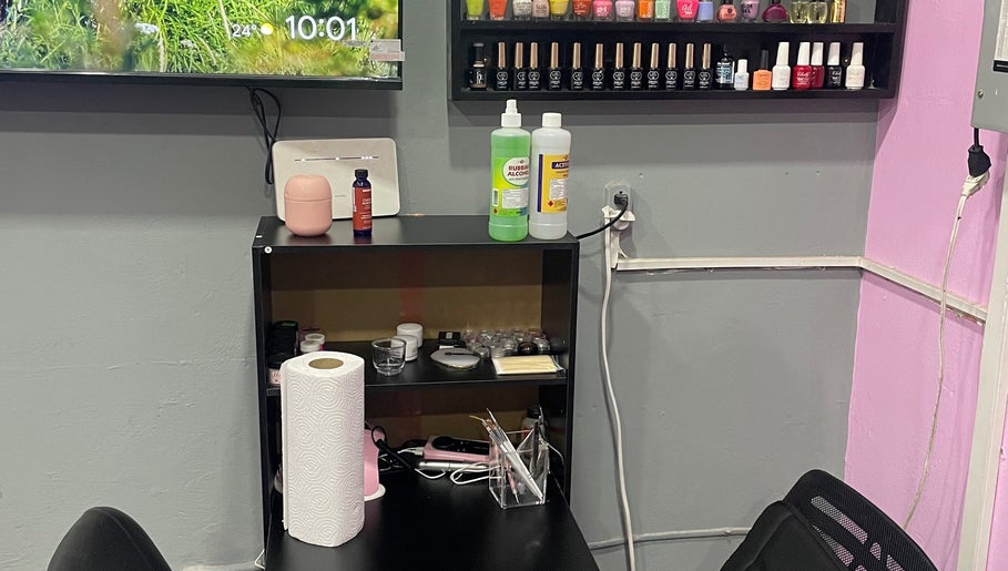 Cozy nail station at Kute Klawz in Trincity, Tunapuna/Piarco Regional Corporation, TT showcasing polish and supplies.