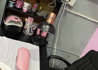 Chic nail station setup at Kute Klawz, Trincity, Tunapuna/Piarco Regional Corporation, TT. Ideal for gel applications.