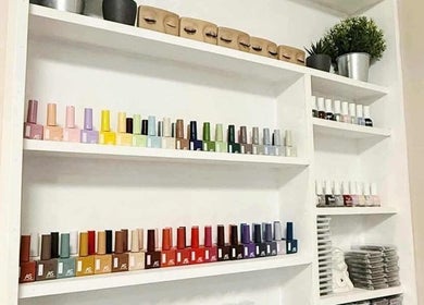 Nail polish display at D'est Lounge, Marikina, Metro Manila, PH, showcasing a vibrant color selection.
