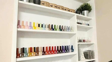 Nail polish display at D'est Lounge, Marikina, Metro Manila, PH, showcasing a vibrant color selection.