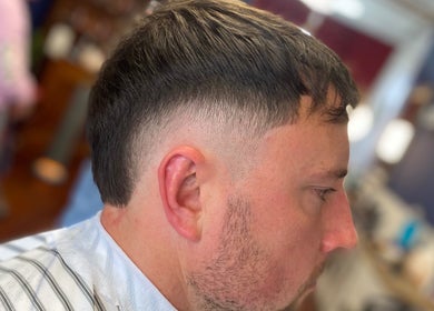 Fresh fade haircut at Indigo Barbers, Auckland, Auckland, NZ, showcasing expertise in grooming.
