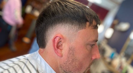 Fresh fade haircut at Indigo Barbers, Auckland, Auckland, NZ, showcasing expertise in grooming.