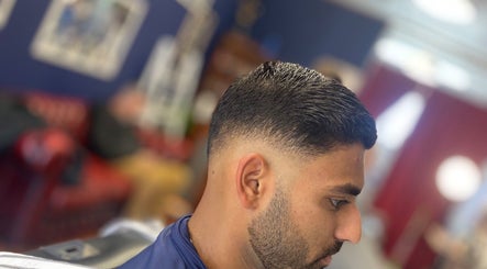 Stylish fade haircut at Indigo Barbers, Auckland, Auckland, NZ. Expert grooming in a chic atmosphere.
