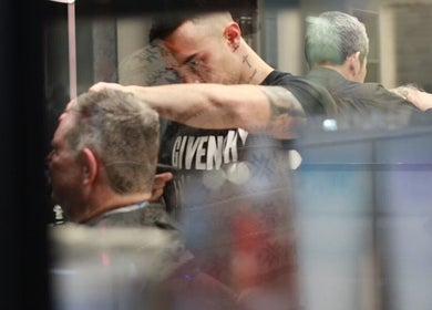 Expert barber styling hair at The Stylish Man | Newmarket, Auckland, Auckland, NZ.