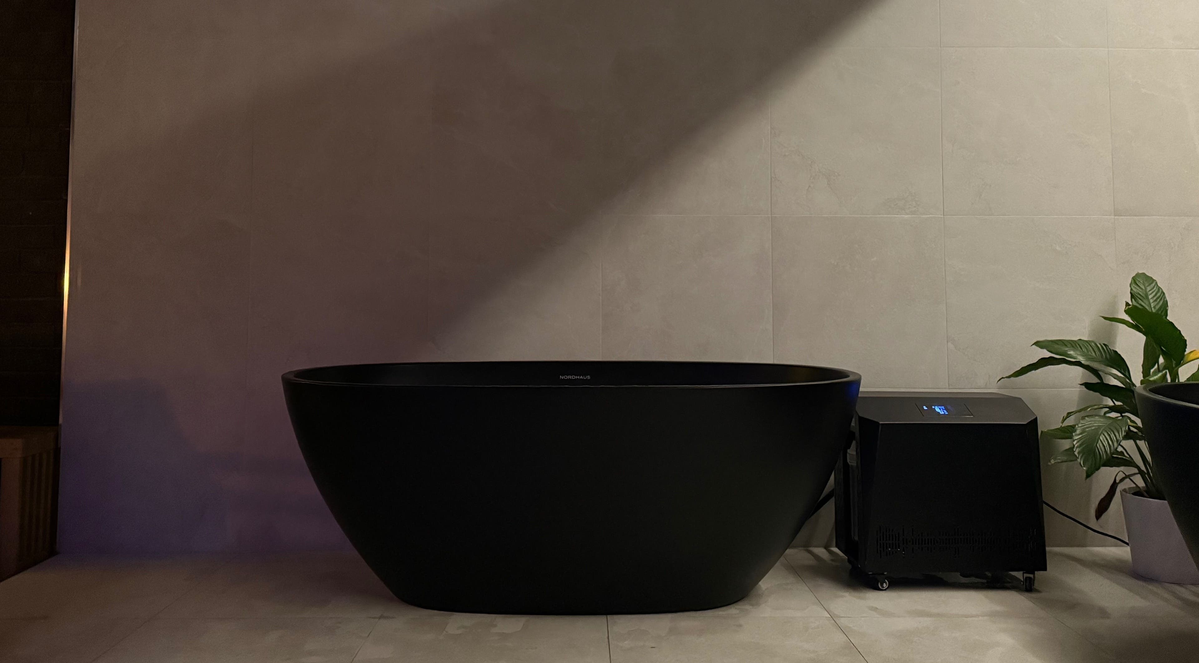 Luxurious black bathtub at ORACLE Wellness, North Richmond, New South Wales, AU.