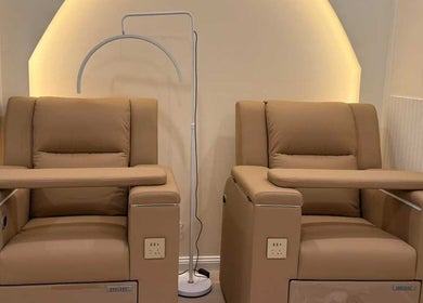 Comfortable nail salon chairs at We3 Nails, Hawthorn, Victoria, AU, with modern lighting.