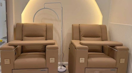 Comfortable nail salon chairs at We3 Nails, Hawthorn, Victoria, AU, with modern lighting.