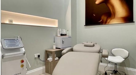 Sophisticated treatment room at Finesse Face™️ in Molesey, England, GB, featuring advanced skincare equipment.