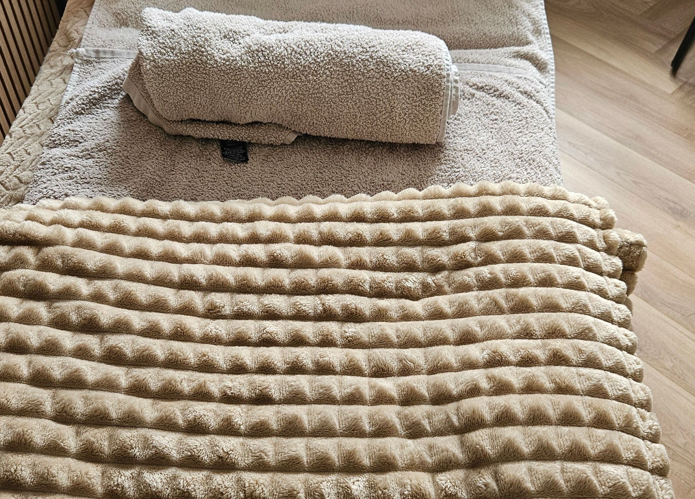 Plush spa bed with luxurious cover at The Skin Studio By Kathryn, Winsford, England, GB.