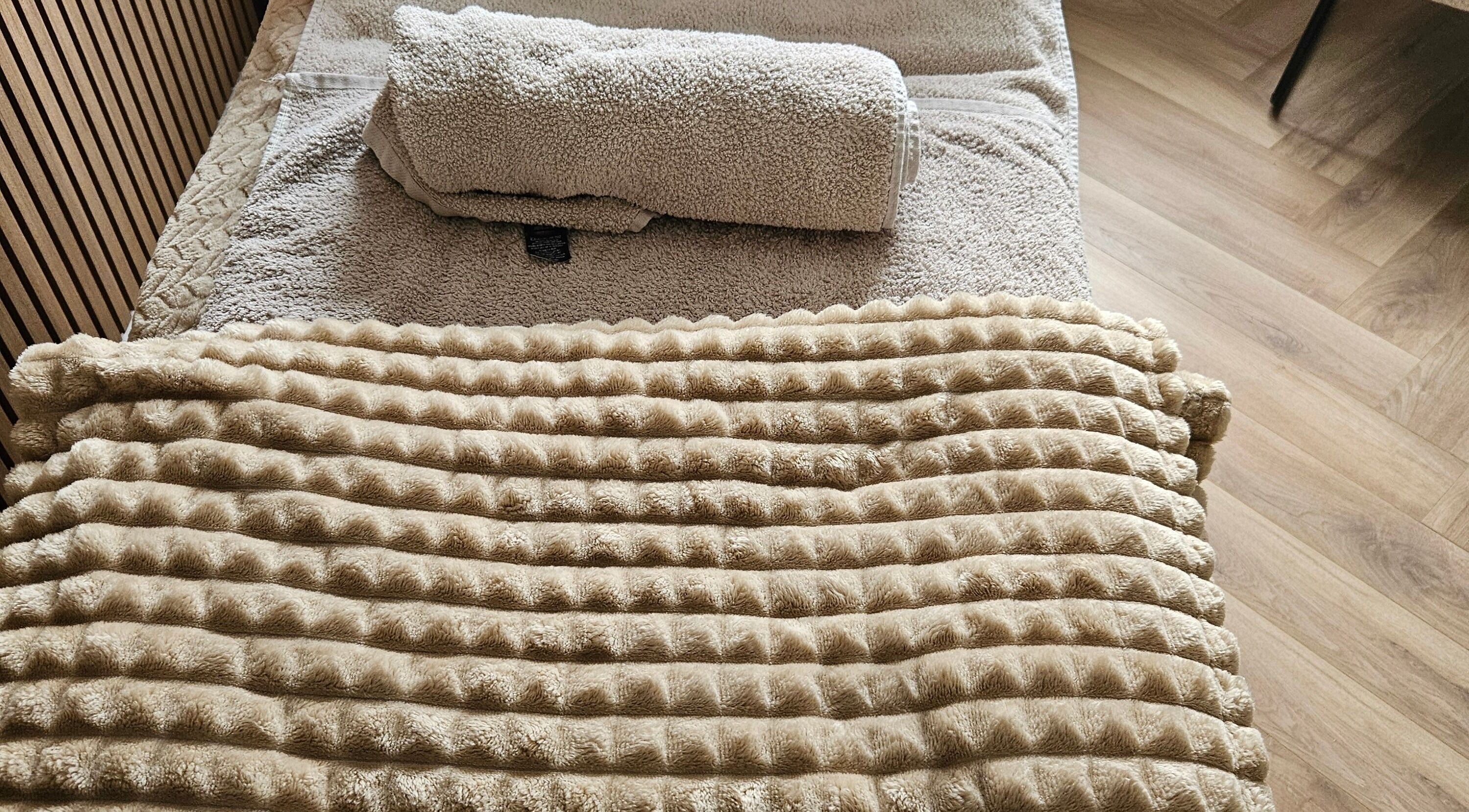 Plush spa bed with luxurious cover at The Skin Studio By Kathryn, Winsford, England, GB.