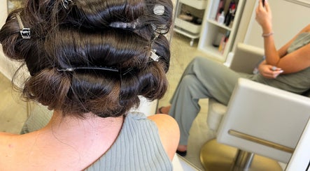 Styled hair with clips in The Blowdry lounge by Alexandra, Upton Northampton, England, GB.