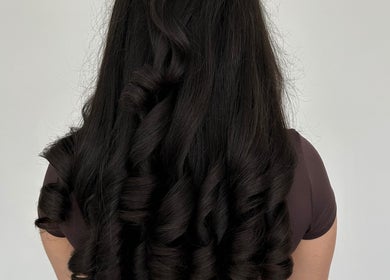 Elegant curls styled at The Blowdry Lounge by Alexandra in Upton Northampton, England, GB.