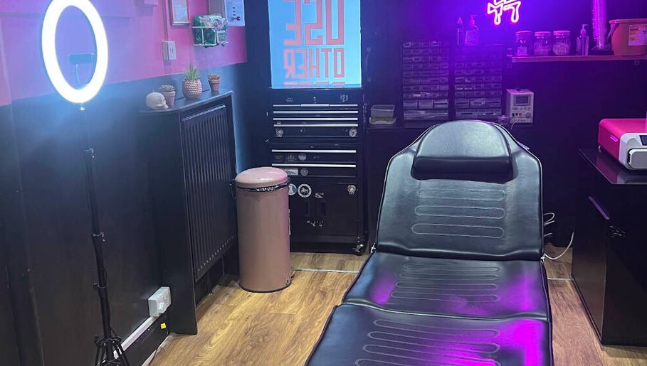 Trendy interior of Pierce Me Jessi B in Newark-on-Trent, England, featuring a modern piercing setup.