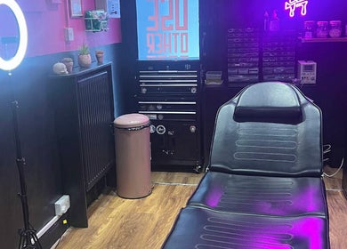 Trendy interior of Pierce Me Jessi B in Newark-on-Trent, England, featuring a modern piercing setup.