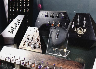 Elegant gemstone piercings displayed at Pierce Me Jessi B in Newark-on-Trent, England, GB.