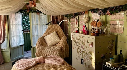 Cozy massage room at Serenity View Massage & Beauty, Ashbourne, England, GB, featuring plush decor.