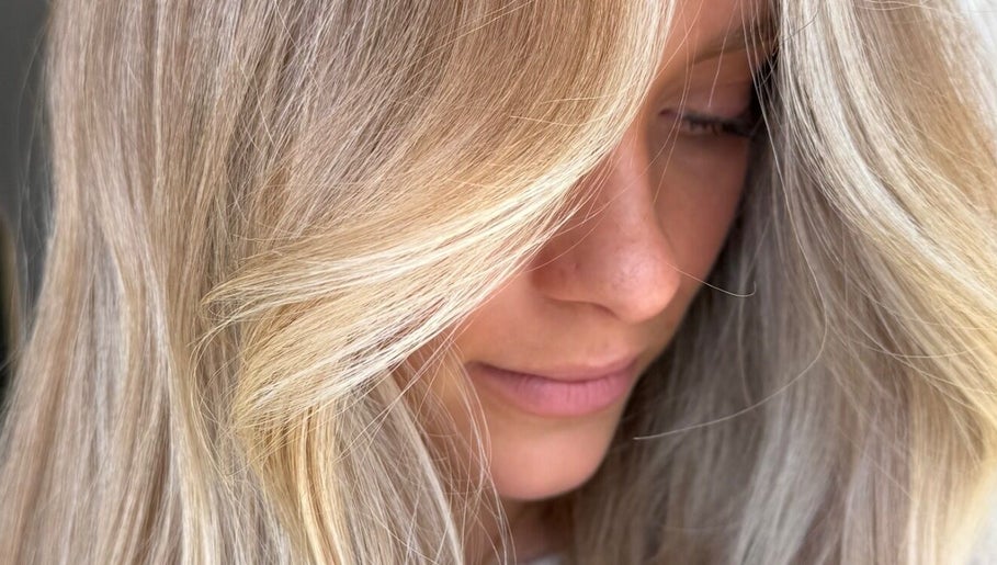 Close-up of golden blonde hair at The Calii, Wollongong, New South Wales, AU, showcasing expert styling.