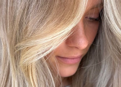 Close-up of golden blonde hair at The Calii, Wollongong, New South Wales, AU, showcasing expert styling.