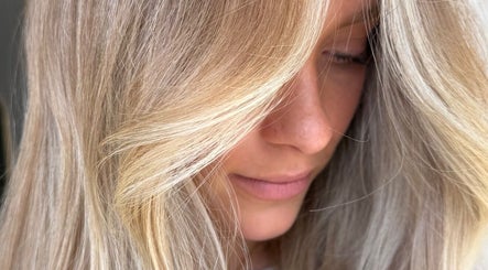 Close-up of golden blonde hair at The Calii, Wollongong, New South Wales, AU, showcasing expert styling.