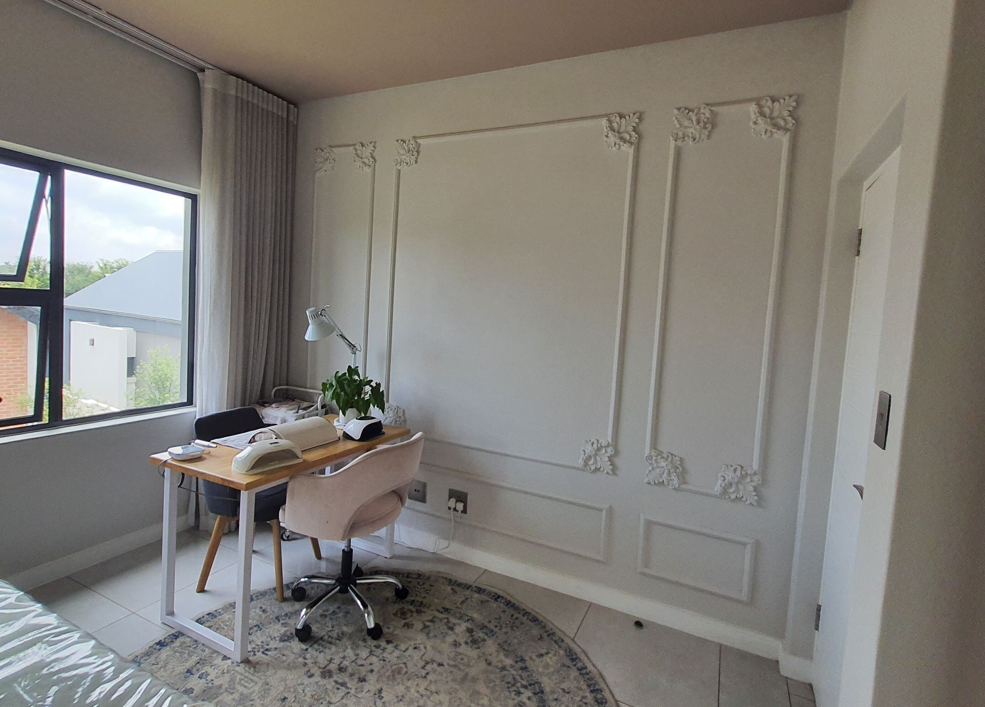 Bright, elegant workspace at AesthetiDerm, Centurion, Gauteng, ZA with chic decor and cozy seating.