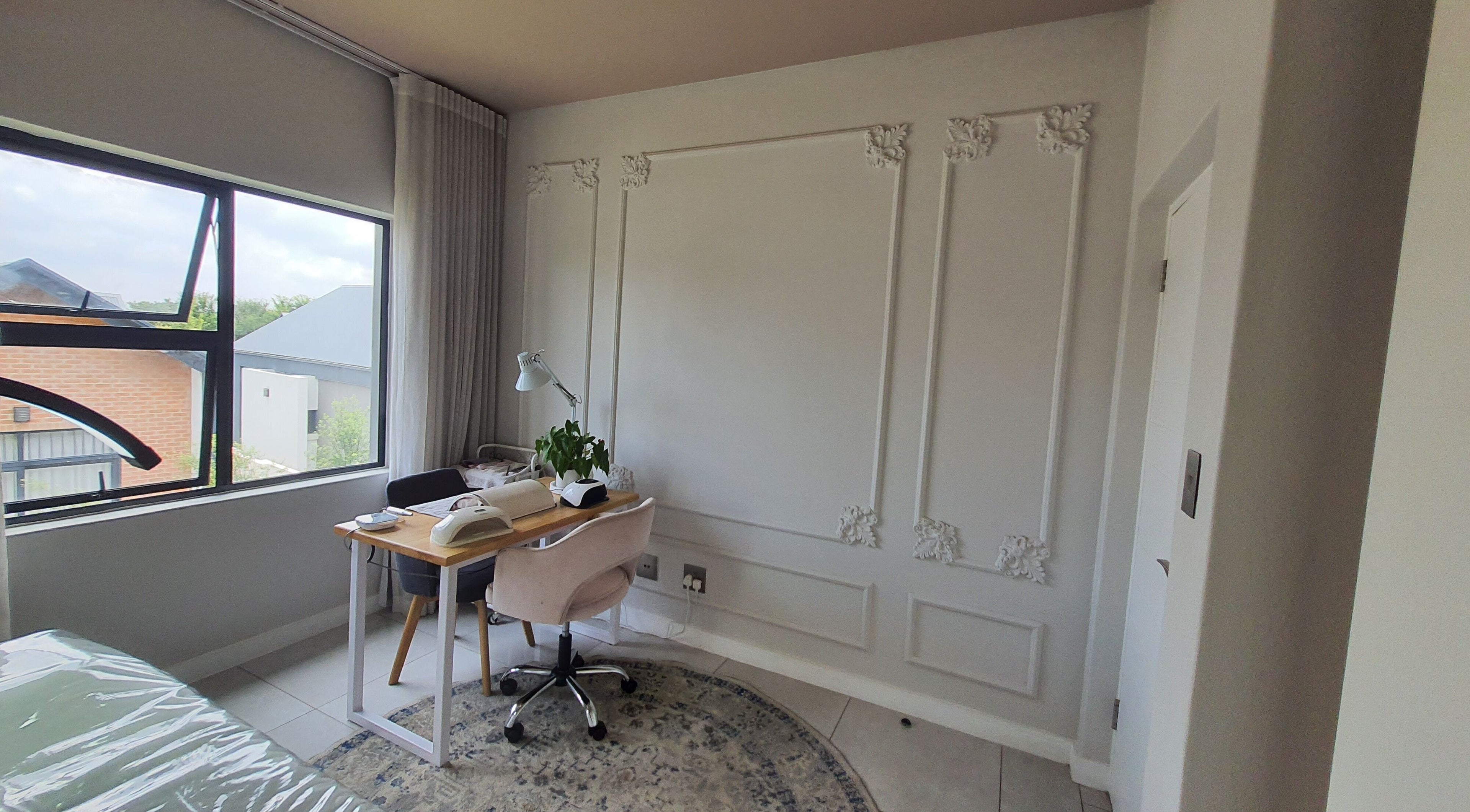 Bright, elegant workspace at AesthetiDerm, Centurion, Gauteng, ZA with chic decor and cozy seating.