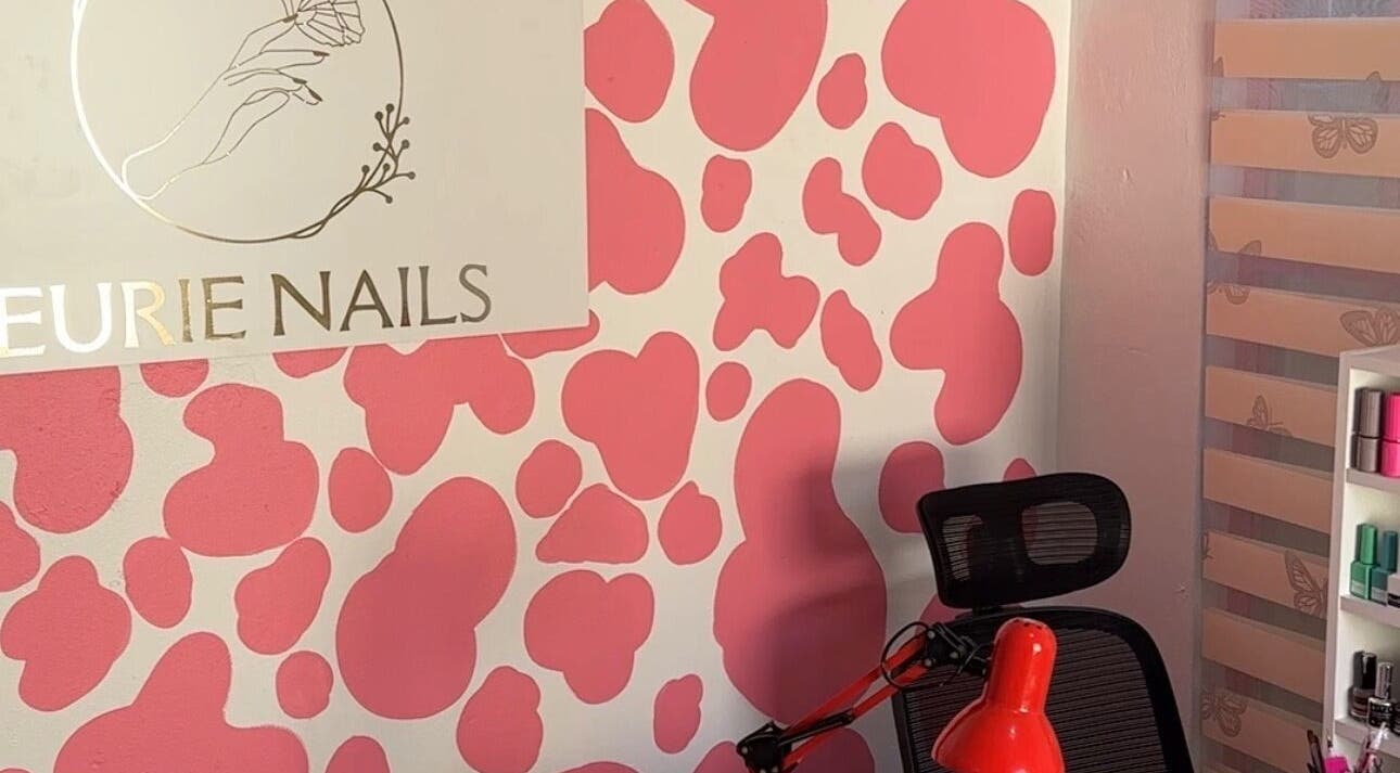 Eurie Nails vibrant interior with pink patterns in Randburg, Gauteng, ZA.