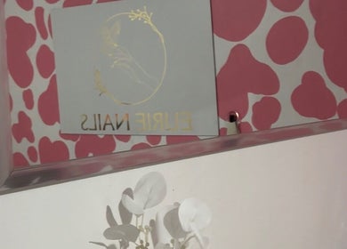 Elegant Eurie Nails wall decor at Randburg, Gauteng, ZA with floral accents.