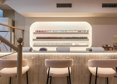 Elegant nail salon interior at Voilà Nails and Beauty Oviedo, located in Oviedo, ES, showcasing modern design.