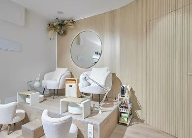 Luxurious pedicure chairs at Voila Nails Beauty Madrid in Madrid, Comunidad De Madrid, ES, offering serene relaxation.