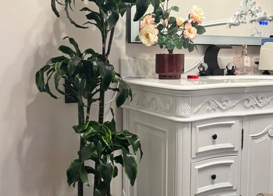 Elegant white vanity with floral decor at Etonne Clinic, New York, New York, US.