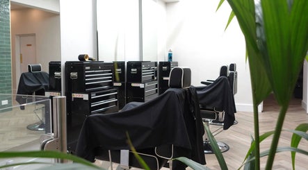 INFINITE Gents Grooming's sleek barber stations in Glasgow, Scotland, GB ready for clients.