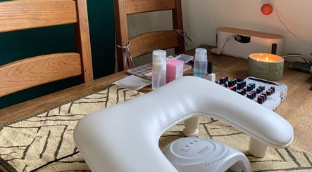 Nail care setup at Nails By Sohf with polishes and tools, Manchester, England, GB.
