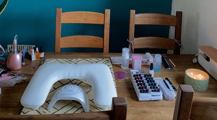 A serene nail salon setup at Nails By Sohf in Manchester, England, GB, showcasing tools and polishes.