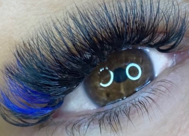 Close-up of eyelash extensions with blue accents at By Frankie Zoe - Milton, Stoke-on-Trent, England, GB.