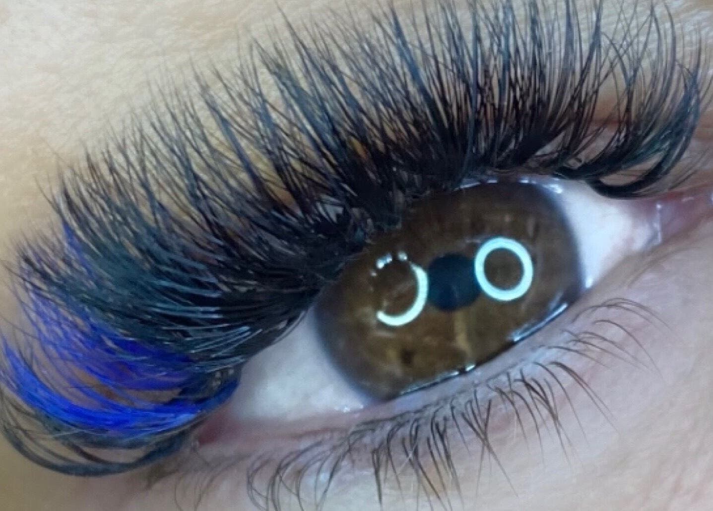 Close-up of eyelash extensions with blue accents at By Frankie Zoe - Milton, Stoke-on-Trent, England, GB.