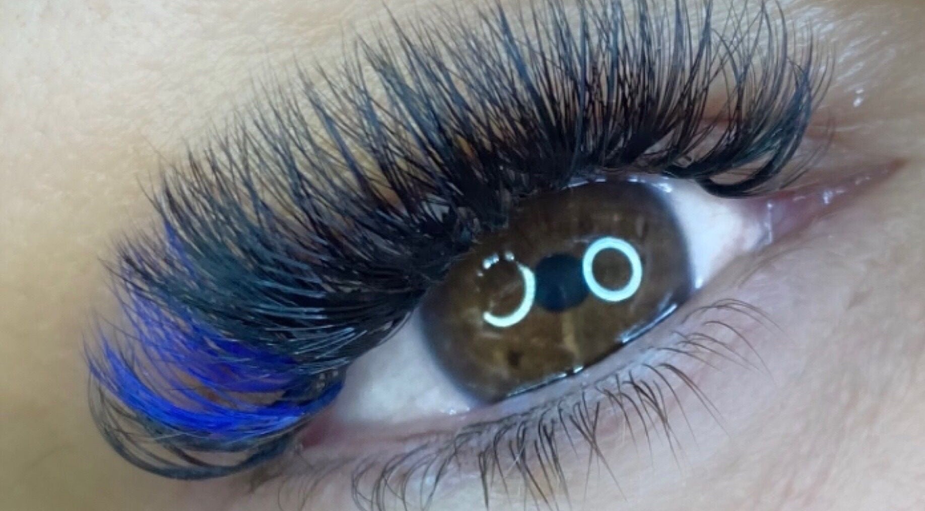 Close-up of eyelash extensions with blue accents at By Frankie Zoe - Milton, Stoke-on-Trent, England, GB.