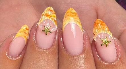Vibrant orange sunset nail art at Rachael Maria Artistry, Belfast, Northern Ireland, GB