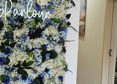 Pretty Parlour's floral wall adds beauty and charm to its location in Evesham, England, GB.