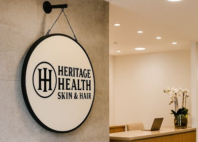 Entrance sign of Heritage Health Skin & Hair, a premier wellness venue in London, England, GB.