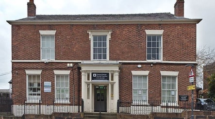 Front view of Victoria Concept Beauty Academy in Prescot, England, GB showcasing its classic architecture.