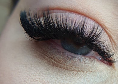 Close-up of eye with elegant eyelash extensions at Victoria Concept Beauty Academy, Prescot, England, GB.
