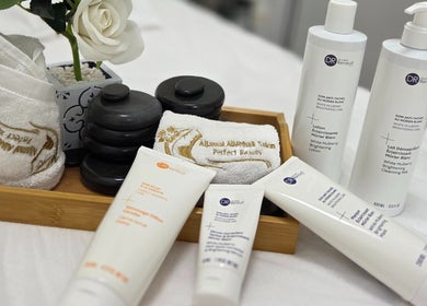 Spa products and towels at Aljamal Almithali Beauty Salon in Ajman, Ajman, AE offering relaxation and skincare.