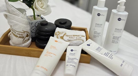 Spa products and towels at Aljamal Almithali Beauty Salon in Ajman, Ajman, AE offering relaxation and skincare.