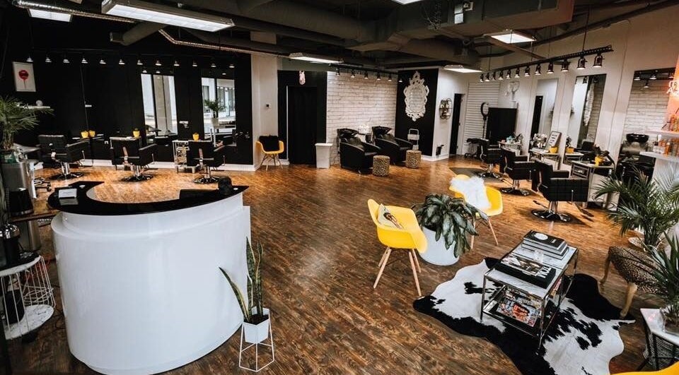 Spacious salon interior at Lindsey at Kashmir, Victoria, British Columbia, CA, featuring modern decor and styling stations.