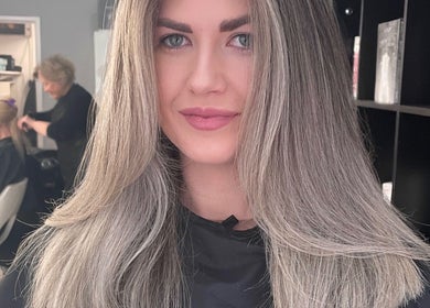 Woman with styled hair at Be You Tiful Hair And Beauty 01792 417957, Swansea, Wales, GB.