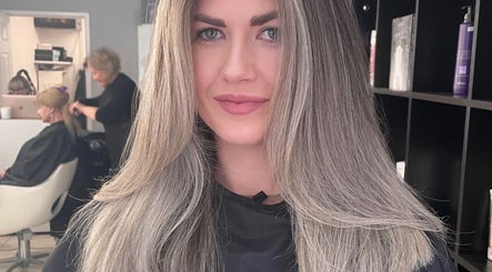 Woman with styled hair at Be You Tiful Hair And Beauty 01792 417957, Swansea, Wales, GB.