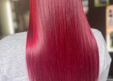 Vibrant red hair style at Be You Tiful Hair And Beauty 01792 417957 in Swansea, Wales, GB, showcasing salon expertise.