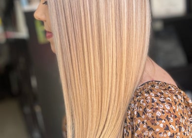 Smooth blonde hair styled at Be You Tiful Hair And Beauty 01792 417957, Swansea, Wales, GB.