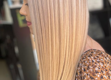 Sleek blonde hair styled at Be You Tiful Hair And Beauty 01792 417957, Swansea, Wales, GB.